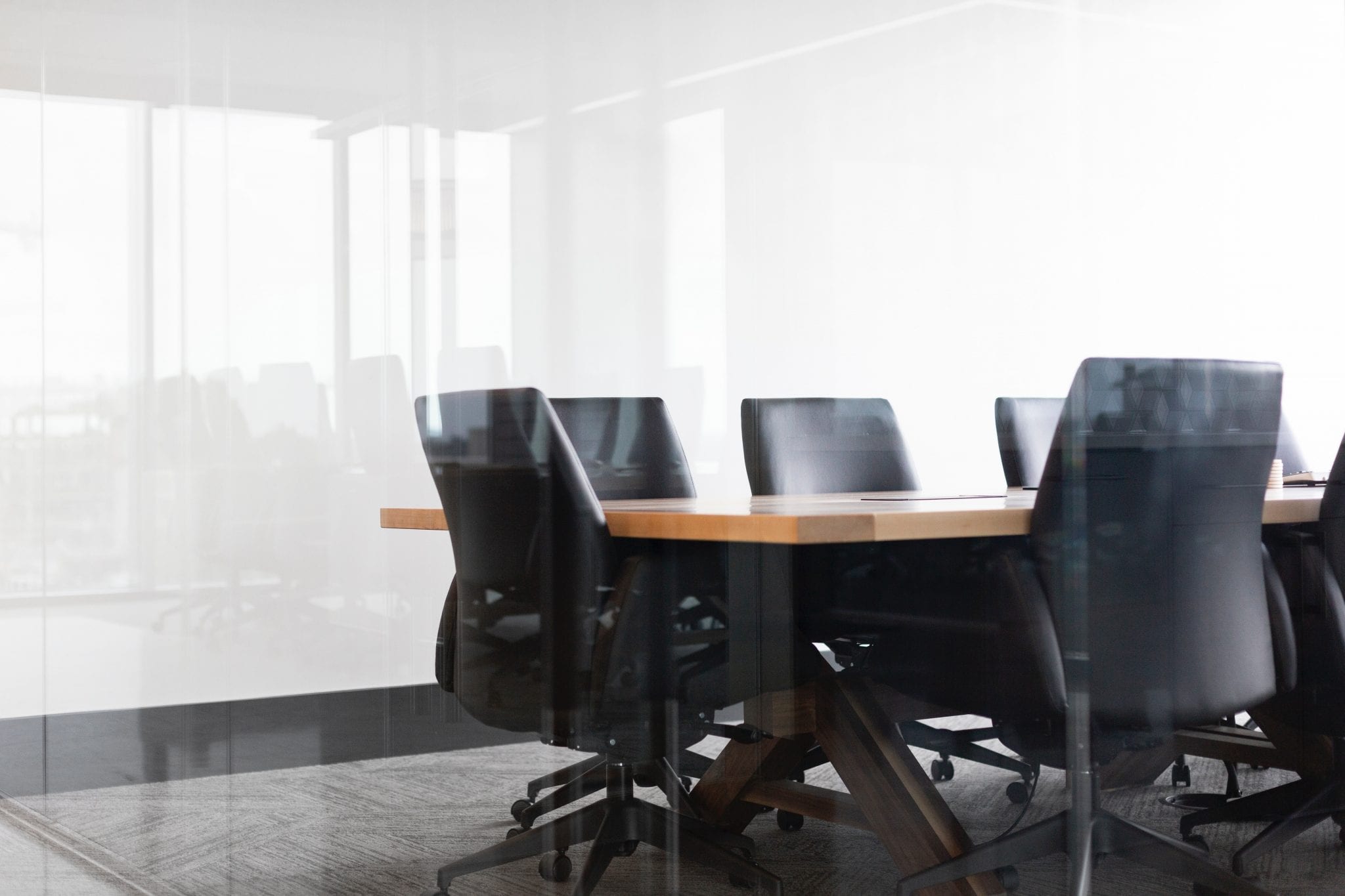 Empty meeting room with a conference table